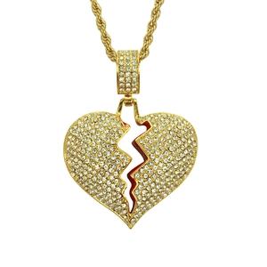 Collier hip hop pendentif cœur brisé doré avec incrustations de pierres zircons