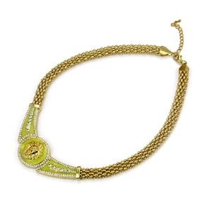 Gold multi-row chain necklace featuring a lime green lion head pendant with rhinestones