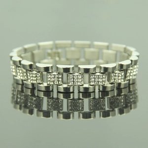Men hip hop silver chain bracelet with rows of sparkling crystals on a mirrored surface