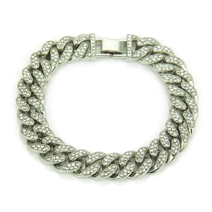 Hip hop silver Cuban link bracelet with clear diamonds in a circular arrangement