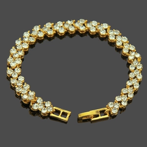 Golden Roman bracelet with double row crystals and press-lock clasp in a minimalist style