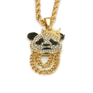 Close-up of iced-out panda pendant with crown and golden rope chain for hip hop style