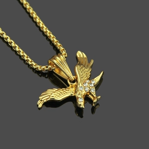 Golden hip hop eagle pendant necklace with sparkling crystals on a sleek box chain