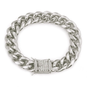Macro view of silver Cuban link bracelet featuring a rectangular buckle with white zircons