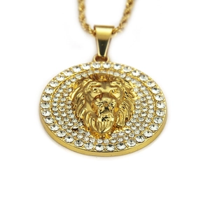 Iced out gold lion head pendant necklace with rhinestones on a classic twisted rope chain