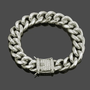 Men's silver Cuban link bracelet featuring a square clasp encrusted with sparkling rhinestones