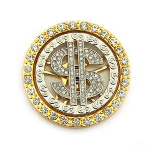 Detailed macro view of rotating dollar sign pendant with sparkling crystal rhinestones