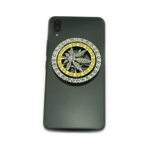 Support rotatif pour téléphone feuille d'érable hip hop avec strass et détails dorés