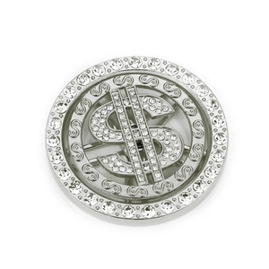 Macro detail of iced-out silver dollar sign pendant with sparkling white rhinestones