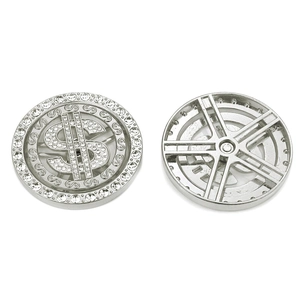 Close-up of sparkling silver rhinestone dollar sign charms for shoe decoration