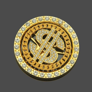 Close-up of gold spinning dollar sign charm with sparkling rhinestones for DIY cases
