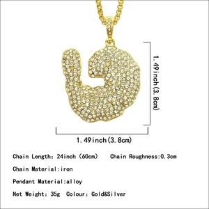 Collier hip hop pour homme avec pendentif biceps plaqué or et strass scintillants
