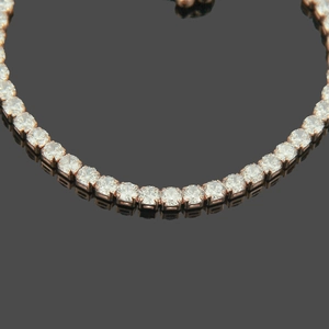Minimalist adjustable copper tennis bracelet with 4mm cubic zirconia in rose gold finish