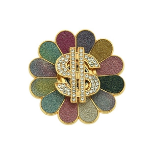 Macro shot of colorful glitter flower ornament with sparkling crystal dollar sign symbol