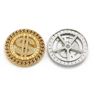 Hip hop style spinning dollar sign pendant with rhinestones in gold and silver finish