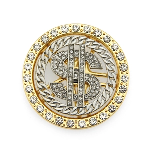 Close-up of spinning dollar sign charm with rhinestones and gold-silver hip hop style metal