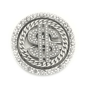 Macro detail of rotating silver US dollar symbol DIY phone case metal accessory with rhinestones