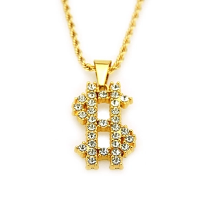 Detailed macro view of iced-out dollar sign pendant with golden rope chain necklace