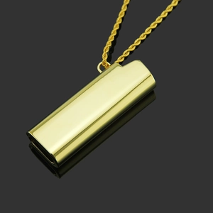 Close-up of polished gold rectangular lighter case pendant with twisted rope chain necklace