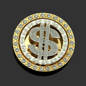 Macro detail of a rotating dollar sign charm with sparkling crystals for phone cases