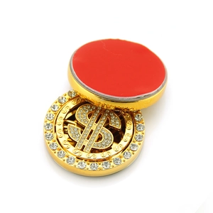 Rotating gold dollar sign car ornament with rhinestones and adhesive base sticker