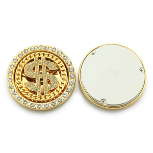 Rotating gold dollar sign phone accessory with sparkling rhinestones and magnetic base