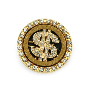 Close-up of golden dollar sign phone accessory with rotating crystal-studded design