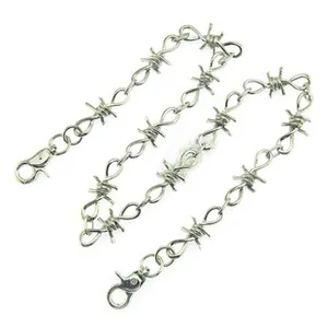 Macro detail of silver punk barbed wire metal pants chain with lobster clasps