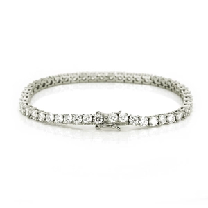 Classic silver-tone tennis bracelet featuring round-cut cubic zirconia in a prong setting