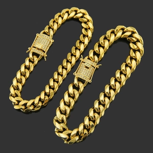 Iced out gold Cuban link chain bracelet for men with micro paved zircon clasp detail