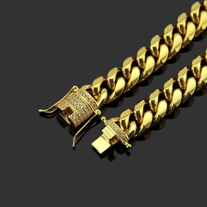 Bracciale cubano da uomo in acciaio dorato con chiusura a micro-pave in zirconia