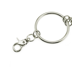 Detailed close-up of a silver punk metal pants chain with a lobster clasp and large ring