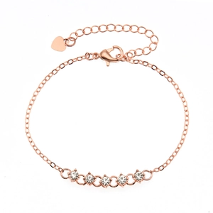 Elegant rose gold bracelet featuring five round rhinestones and a heart charm pendant