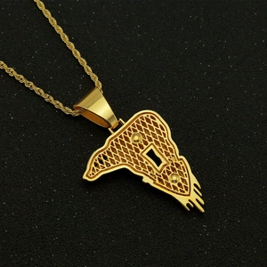 Detailed view of gold-plated V-shaped hollow pendant necklace with twisted rope chain