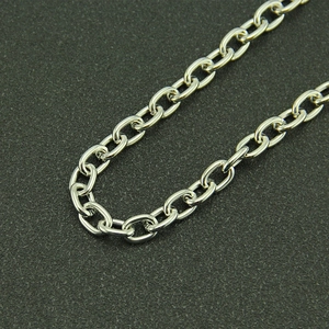 Macro shot of silver triple-layered metal pant chain with polished cable link texture