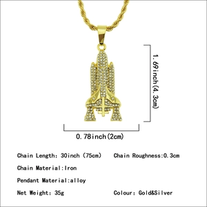Hip hop gold rocket pendant necklace with sparkling rhinestones on a thick twist chain