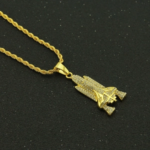 Hip hop gold rocket pendant necklace with sparkling rhinestones on twisted rope chain