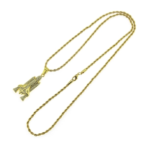Gold iced out space shuttle pendant necklace with sparkling stones on thick rope chain