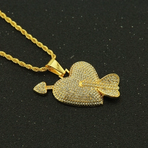 Hip hop heart pendant necklace with cupid arrow in gold plating and white rhinestones
