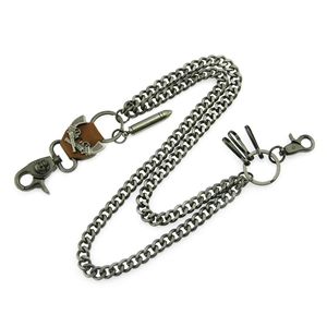 Detail of gunmetal punk wallet chain with skull clasp, dual guns tag and bullet pendant