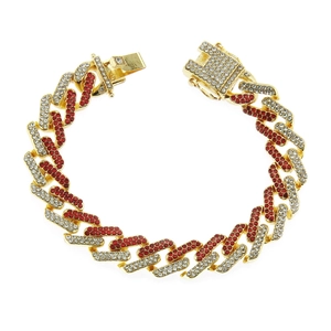 Macro detail of gold Cuban chain link bracelet with red and white pave rhinestones