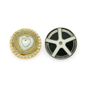 Sparkling diamond heart and silver star car vent clips on a clean white background