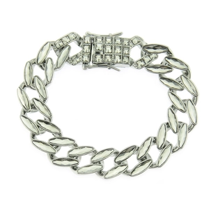 Detail of silver Cuban link bracelet with marquise and square cut rhinestones