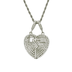 Close-up of hip hop style broken heart pendant with iced-out rhinestones and rope chain