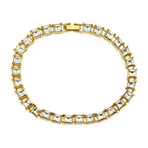 Macro detail of men's gold hip hop bracelet with sparkling square-cut cz stones