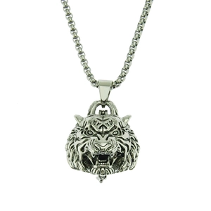 Detailed view of an antique silver tiger cremation urn necklace with a sturdy box chain