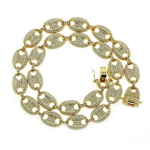 Close-up of gold-plated coffee bean link necklace with pave-set shimmering rhinestones