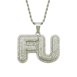 Close-up of iced-out silver FU letter pendant with sparkling rhinestones on rope chain