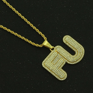 Iced-out gold plated 3D letter FU pendant necklace with sparkling zircons on rope chain