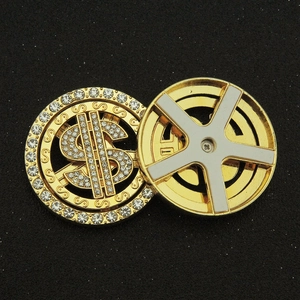 Rotating gold dollar sign phone accessory with sparkling crystals and a cool wheel design